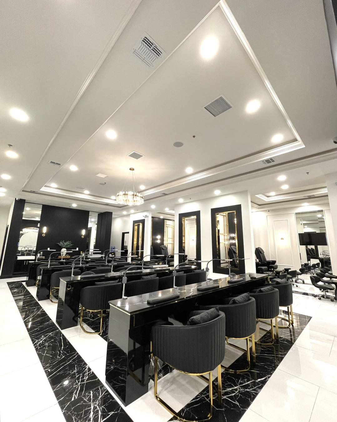 Ja'noir Nail Lounge main floor with crystal chandelier