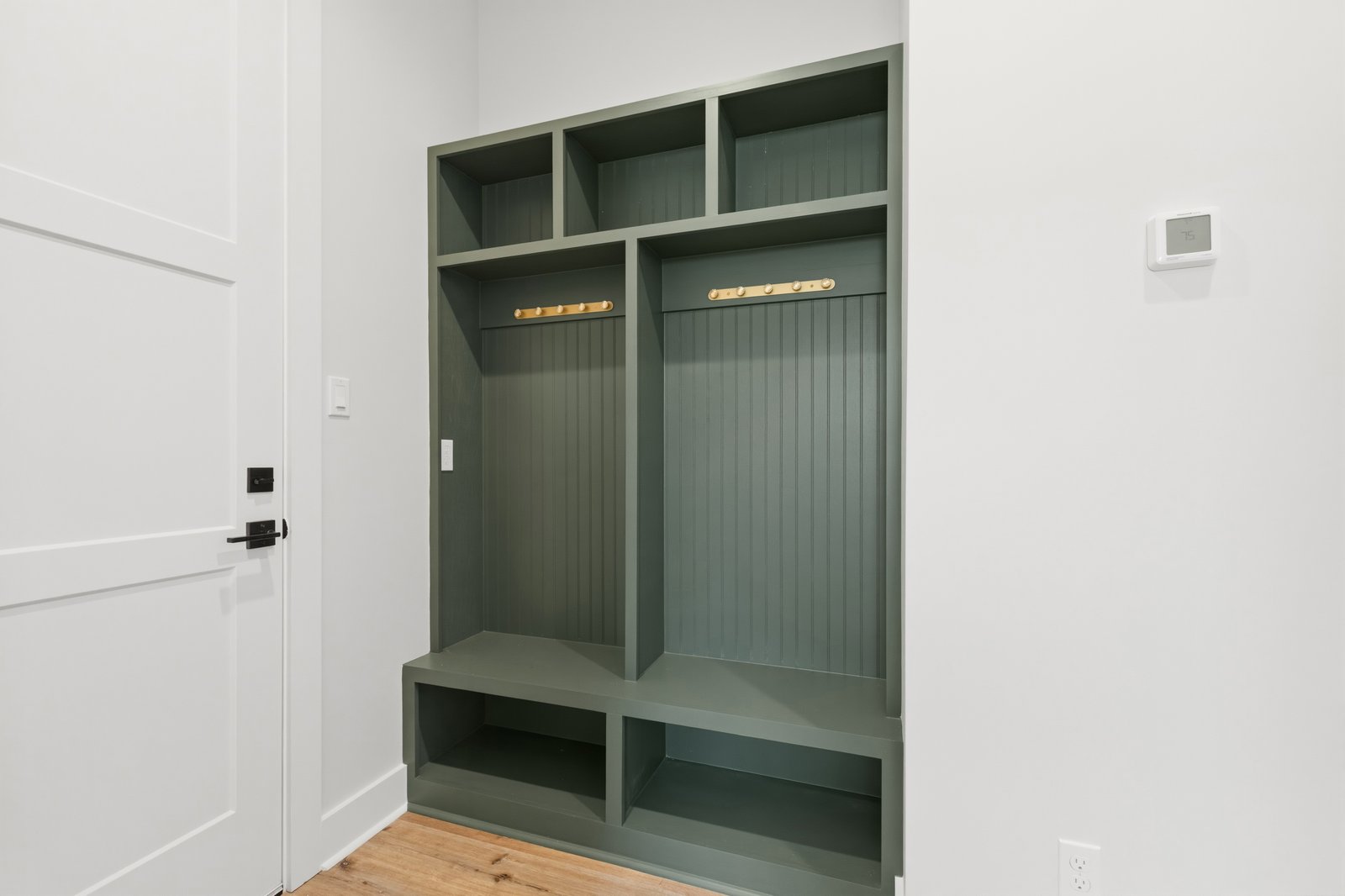 Kitchen wet bar with wine rack and beverage cooler